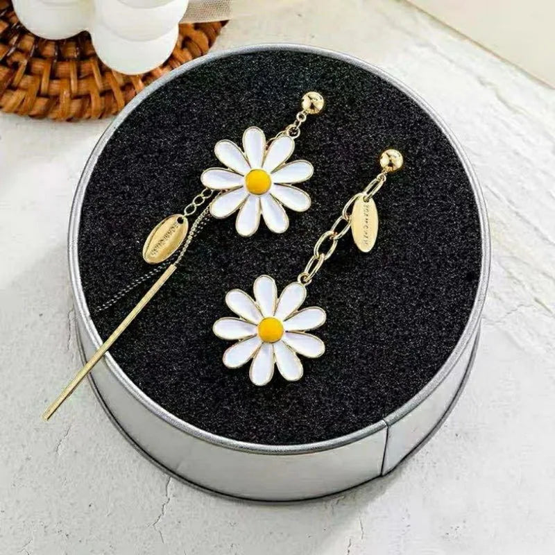 asymmetric daisy earrings