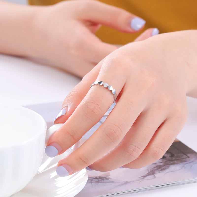 assorted silver rings