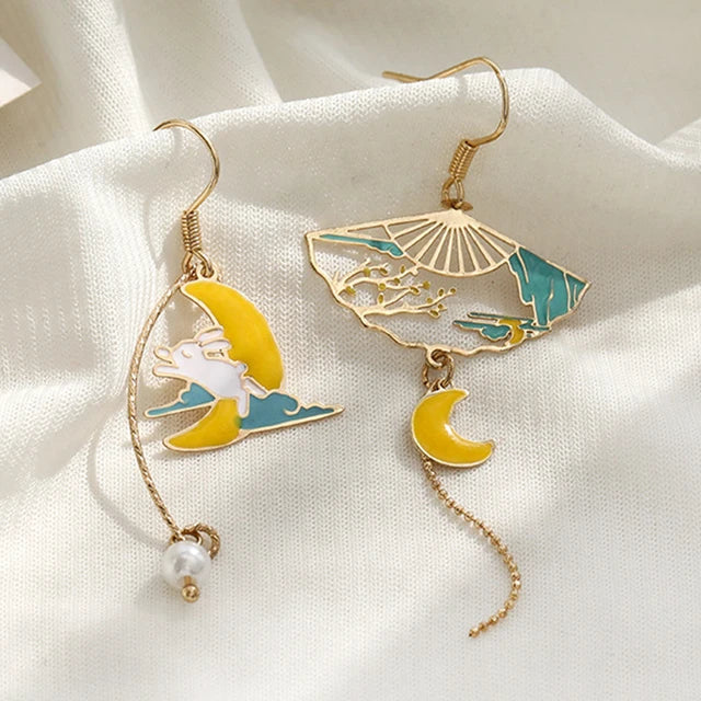 assorted asymmetric cat earrings