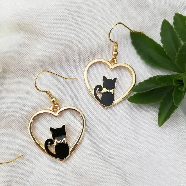 assorted asymmetric cat earrings