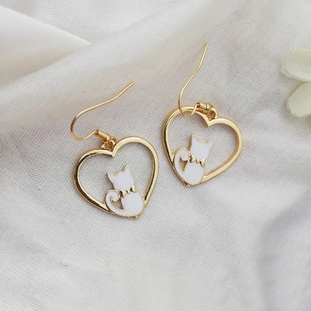 assorted asymmetric cat earrings