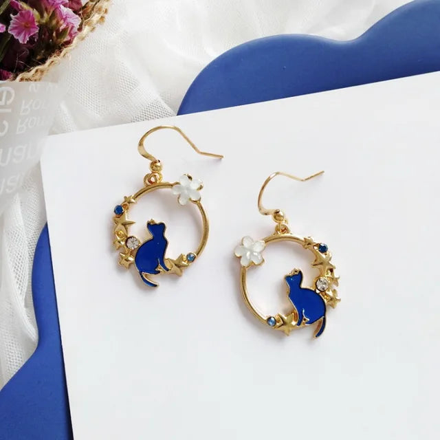 assorted asymmetric cat earrings