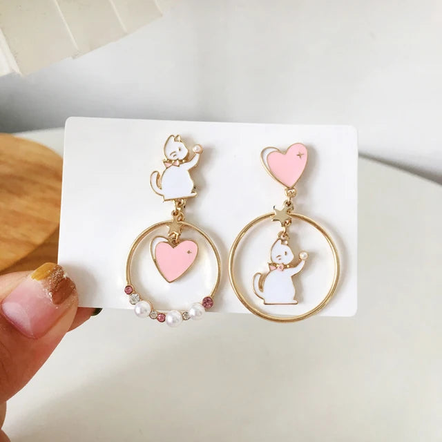 assorted asymmetric cat earrings