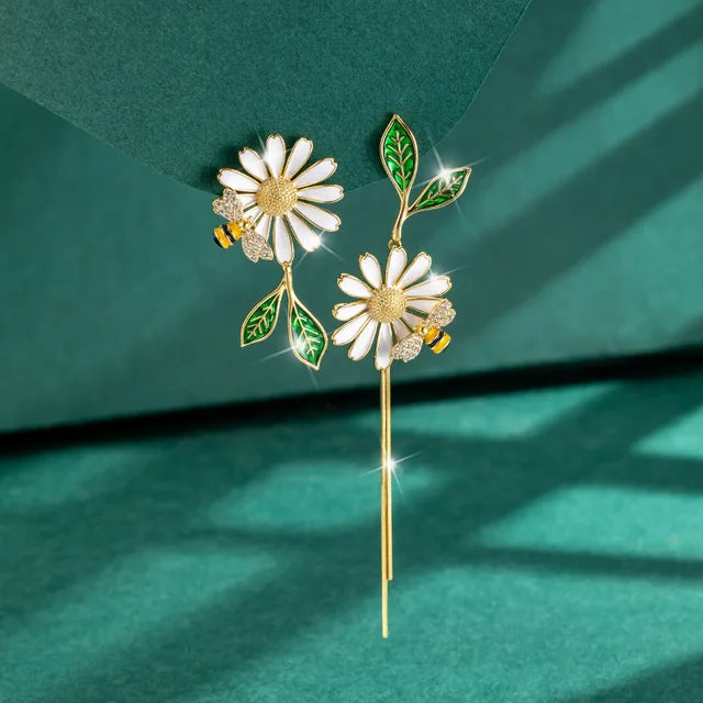 asymmetric daisy earrings